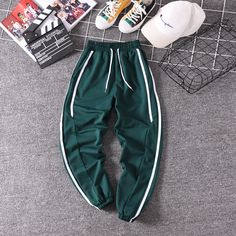 FREE SHIPPING Women Striped Jogger Pants JKP1809 Green Full Length Sportswear Bottoms, Green Jogging Pants With Elastic Waistband, Green Stretch Sweatpants For Leisure, Trendy Green Joggers, Green Stretch Sweatpants With Tapered Leg, Green Sports Bottoms Long Pants, Green Bottoms For Sports, Green Bottoms For Jogging In Spring, Green Sports Bottoms