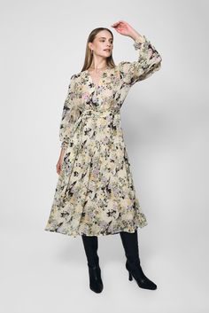 Introducing our boho style Sofia Floral Dress, a delightful and versatile piece that combines elegance with a touch of playfulness. This enchanting dress features a soothing beige pastel hue, long sleeves, and a front tie button , creating a chic and feminine look in this Lakeyo piece. Model's measurement is Height: 173cm / 5'8'' Bust: 84cm / 33'' Waist: 64cm / 25'' Hips: 89cm / 35'' - Length: Midi - Long Sleeves - Front tie waist detail - Flowy hemline - Elastic cuff design Composition: 100% Polyester Lining: 100% Polyester Please note: The Lakeyo clothing range runs half a size smaller than standard AU clothing sizes, please consider the size before purchase. Feminine Beige Long Sleeve Midi Dress, Feminine Long Sleeve Beige Midi Dress, Cream Long Sleeve Maxi Dress For Brunch, Long Sleeve Midi Dress For Spring Garden Party, Feminine Long Sleeve Beige Dress, Fitted Beige Long Sleeve Dress For Spring, Spring Beige Maxi Dress With Tie Waist, Cream Midi Dress For Spring Garden Party, Beige Long Sleeve Maxi Dress For Garden Party