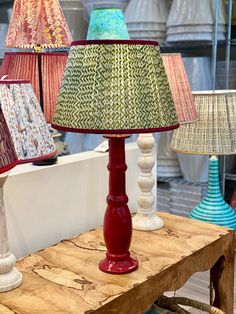 Handcrafted in England, this Penny Morrison lampshade combines a contemporary green and white trellis pattern with a contrasting red trim at both top and bottom. The pleated shade has an empire silhouette and is constructed from hand block printed Indian silk lined with a cream colored cotton. (Due to the handmade nature of this product, color and pattern may vary.) Comes with a US fitter. We measure all lampshade dimensions by: top diameter x bottom diameter x side length. Availability: In-stoc Penny Morrison Lampshade, Striped Lampshade, Box Pleat Lampshade, Vintage Pleated Lamp Shade, Block Print Lampshade, Contemporary Trellis, White Trellis, Silk Lampshade, Cottage Style Decor