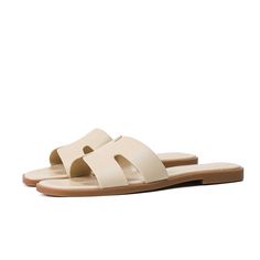 PRICES MAY VARY. 👡【Soft Faux leather Upper】Stratuxx Kaze womens sandals are made from high-quality faux leather materials, soft and breathable,provide you with comfort. 👡【Fashion Design】Stratuxx Kaze flat slides with fashion band shape design for the everyday elegant minimalist modern woman. 👡【Rubble Outsole】Stratuxx Kaze womens slide sandals Anti-skid rubber outsole with 1.5cm heel, soft insole platform make you whole day walk comfortable. 👡【Easy to wear】This sandals women dressy fashion sa Spring Beige Flat T-strap Sandals, Summer Slides With Open Heel, Trendy Leather Slingback Beach Sandals, Leather Open Toe T-strap Sandals For Summer, Chic Open Toe T-strap Sandals For Vacation, Trendy Leather Slingback Sandals For Beach, Elegant Slide Sandals For Vacation, Beige Open Toe T-strap Sandals For Spring, Chic Beige T-strap Sandals For Summer