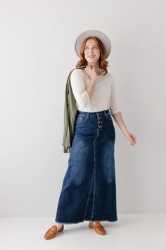 A long denim skirt so comfortable you will never want to take it off! The 'Haven' denim skirt in dark wash is made out of a stretch denim to keep you comfy wherever life takes you! This skirt has all of the vintage features you love- buttons up the front, working pockets, an A-line design, and a raw edge hem. Exclusively designed by us, for you! 95% Cotton 5% Spandex Wash Cold Gentle Cycle Hang to Dry Low Iron if Needed Model Height 5'8" | Wearing Size 2 Model Height 5'6" | Wearing Size 16 Pleas Dark Wash High Rise Casual Maxi Skirt, Casual High Rise Dark Wash Maxi Skirt, Everyday Dark Wash Denim Skirt, High Rise Dark Wash Denim Skirt For Everyday, Everyday High-rise Denim Skirt For Fall, Modest Denim Skirts, Jean Skirts, Skirts Denim, Denim Skirt Outfits