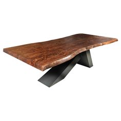 a wooden table with black metal legs and a slab of wood on the top, against a white background