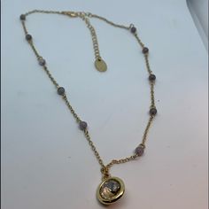 Golden Chain With Glass Beads In A Pendant Holding A Round Krystal 18 Inches Long Lobster Claw Latch And A 3 Inch Extender Gray Faceted Beads Necklace For Gifts, Golden Chain, Crystal Pendant, Lobster Claw, Womens Jewelry Necklace, Glass Beads, Jewelry Necklaces, Women Jewelry, Beads