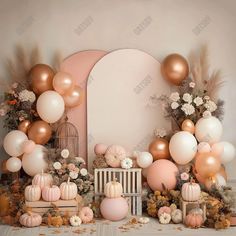 a backdrop with balloons, flowers and pumpkins