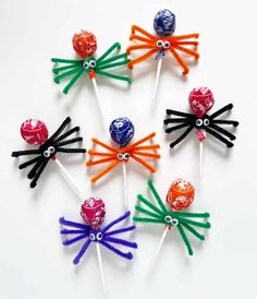 six candy lollipops in different colors and sizes