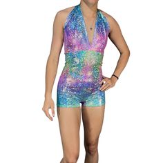 Made of our rainbow avatar holographic spandex, this halter romper hugs the body, but offers plenty of stretch. The halter top ties at the back of the neck. Our seamless front design is extremely comfortable and prevents camel toe. Wear this to a rave, to a festival, or an aerial performance. Multicolor Stretch Halter Neck Bodysuit, Fitted Multicolor Backless Bodysuit, Multicolor Backless Bodysuit For Party, Disco Bodysuit For A Summer Night Out, Multicolor Fitted Halter Neck Jumpsuits And Rompers, Multicolor Fitted Halter Neck Jumpsuit, Fitted Multicolor Halter Neck Jumpsuit, Fitted Sleeveless Rave Bodysuit, Multicolor Halter Neck Jumpsuits And Rompers For Party