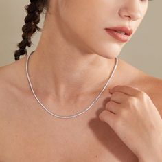 Elevate your style with this stunning 3.50 Carats Diamond Luxury Tennis Necklace in 14K or 18K White Gold, featuring lab-grown diamonds. This exquisite diamond choker necklace makes a perfect birthday present for her. Sparkle with confidence and sophistication, perfect for any occasion. 𝐅𝐞𝐚𝐭𝐮𝐫𝐞𝐬: * 𝐌𝐚𝐝𝐞 𝐭𝐨 𝐎𝐫𝐝𝐞𝐫 * 𝐌𝐞𝐭𝐚𝐥: 𝟏𝟒𝐊 𝐆𝐨𝐥𝐝 | 𝟏𝟖𝐊 𝐆𝐨𝐥𝐝  * 𝐁𝐚𝐧𝐝 𝐂𝐨𝐥𝐨𝐫𝐬: Rose Gold, Yellow Gold & White Gold * 𝐖𝐢𝐝𝐭𝐡: 1.70 MM 𝐂𝐞𝐧𝐭𝐞𝐫 𝐬𝐭𝐨𝐧𝐞: * 𝐒𝐭𝐨𝐧𝐞 - Lab Grown Diamond * 𝐒𝐡𝐚𝐩𝐞 - Brilliant Cut Round * 𝐃𝐢𝐚𝐦𝐨𝐧𝐝 𝐒𝐢𝐳𝐞 - 1.70 MM * 𝐂𝐚𝐫𝐚𝐭 𝐖𝐞𝐢𝐠𝐡𝐭 - 3.50 Carats (𝐅𝐨𝐫 𝟏𝟔 𝐈𝐧𝐜𝐡) * 𝐂𝐨𝐥𝐨𝐫 - D-E-F * 𝐂𝐥𝐚𝐫𝐢𝐭𝐲 - VS 𝐓𝐡𝐞 𝐜𝐚𝐫𝐚𝐭 𝐰𝐞𝐢𝐠𝐡𝐭 𝐢𝐬 𝐚𝐩𝐩𝐫𝐨𝐱𝐢𝐦𝐚𝐭𝐞 𝐚𝐧𝐝 𝐦𝐚𝐲 𝐯𝐚𝐫𝐲 𝐬𝐥𝐢𝐠𝐡𝐭𝐥𝐲. Classic Tennis Necklace In Diamond White As Gift, Classic Tennis Necklace In Diamond White For Gift, Classic Diamond White Tennis Necklace Gift, Classic Diamond White Tennis Necklace As Gift, White Diamond Single Strand Tennis Necklace, White Sterling Silver Tennis Necklace Fine Jewelry, White Single Strand Luxury Tennis Necklace, White Single Strand Tennis Necklace For Gift, Classic White Tennis Necklace For Gift