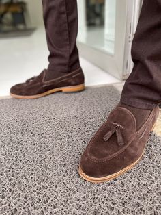 Discover the perfect blend of style and comfort with Remy Brown Suede Tassel Loafers for Men. Crafted from premium suede leather, these loafers feature a luxurious calf skin lining for superior comfort, making them ideal for both formal occasions and smart-casual outings. Whether you're heading to a business meeting or a wedding, these versatile shoes elevate any outfit with elegance. - Sole: Rubber - Inner Lining: Calf Skin - Material: Suede Leather - Available Sizes: 39-45 Slip-on Tassel Loafers For Galas, Closed Toe Slip-on Tassel Loafers For Galas, Slip-on Tassel Loafers For Galas With Closed Toe, Casual Tassel Loafers With Plain Toe For Galas, Casual Plain Toe Tassel Loafers For Galas, Brown Slip-on Tassel Loafers For Galas, Brown Tassel Loafers For Galas, Casual Tassel Loafers With Round Toe For Galas, Tassel Slip-on Loafers For Galas