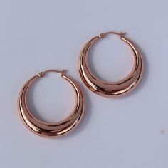 For a simple pair of earrings that always look fabulous, choose these light weight hoop earrings. With a hollow middle, made from stainless steel and finished with 14kt rose gold plating, these earrings are incredibly versatile. We love the shiny, sweet rose gold, and the lightweight feel for all day comfort. Shop these versatile earrings for yourself or for someone special to make a fabulous gift! Clean with a jewellery polishing cloth. Store in a safe place separately to avoid scratching. Brown Hair Blue Eyes, Simple Rose, Jade Bangle, Rose Gold Jewelry, Triangle Shape, Rose Gold Earrings, Independent Designers Fashion, Gold Plating, Jewelry Inspiration