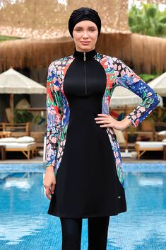 Our swimsuit, crafted from special lycra fabric, adds elegance to your style with its dazzling patterns. Its flexible structure provides you with freedom of movement. Place your order now and become the most stylish woman on the beach! The post Soft Burkini appeared first on Burkini Remsa. Woman On The Beach, Modest Swimsuits, Lycra Fabric, Pool Days, Freedom Of Movement, Zipper Detail, Simple Dresses, Hijab Fashion, Stylish Women