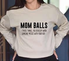 "Mom Balls Sweatshirt, Mom Hoodie, Gift for Mom, Funny Sweater, Mom Life Sweatshirt, Funny Sweater for Mom, Mothers Day Sweater 🔷 HOW TO PLACE YOUR ORDER? 🔷 Please be sure to carefully review the size, color, and design options provided in this listing. ✅ Select your desired size and shirt color from the available menus. ✅ Fill in the customization box with your preferred design color. You can refer to the listing photos to see the color choices. ✅ Choose the quantity you wish to purchase. ✅ C Funny Cotton Sweatshirt For Winter, Funny Long Sleeve Tops With Text, Funny Cotton Winter Sweatshirt, Funny Long Sleeve Cotton Hoodie, Funny Cotton Tops For Winter, Winter Cotton Tops With Funny Text, Funny Long Sleeve Cotton Sweatshirt, Winter Cotton Sweatshirt With Funny Text, Funny Long Sleeve Cotton Sweater