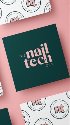 the nail tech logo is on top of some business cards