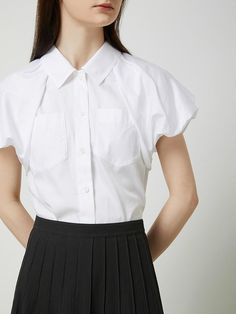 This Cotton Voluminous Sleeve Shirt is a versatile piece that adds a touch of femininity to any outfit. It features the pleated detail adding volume from the shoulder to the sleeves.- Appropriate length allowing for versatile looks- Shirring on the back panel for a feminine silhouette- Point pockets on both sides of the chest for added style* The color of the actual product may vary due to differences in monitor color settings and resolution. Office Puff Sleeve Top With Pleated Sleeves, Fall Short Sleeve Blouse With Pleated Sleeves, Workwear Blouse With Pleated Short Sleeves, Chic Shirt With Gathered Sleeves For Work, Chic Workwear Shirt With Gathered Sleeves, Summer Formal Tops With Pleated Sleeves, Summer Tops With Pleated Sleeves, Relaxed Fit Ruffle Sleeve Blouse For Work, Relaxed Fit Blouse With Ruffle Sleeves For Work