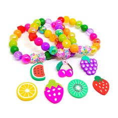 These adorable bracelets are the perfect favor for your little one's pineapple and flamingo themed party! Each bracelet features an enameled charm, resin rhinestone beads and an assortment of deep pink, bright pastel pink, golden yellow and green 10mm acrylic beads strung with durable stretch floss cord. Each bracelet comes individually packaged in organza bags. Please message me if you have any questions or if you would like to make some changes to this item. To be the first to know about new i Sweet Multicolor Party Jewelry, Playful Jewelry With Charms And Round Beads, Playful Jewelry With Round Bead Charms, Playful Jewelry With Round Beads And Charms, Pink Novelty Craft Supplies For Birthday, Novelty Pink Craft Supplies For Birthday, Playful Plastic Jewelry For Gifts, Adjustable Sweet Jewelry For Party, Playful Plastic Jewelry Gift