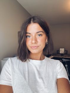 Womens haircut, short hair, bob haircut, brunette Fine Hair Haircuts Brunette, Brown Wavy Bob Hair, Women Above Shoulder Haircut, Brunette Bob Straight Hair, Bob Right Above Shoulders, Brown Hair Bob Haircut, Short Brunette Hair Curly, Brown Short Hair Round Face, Short Hair Women Brunette