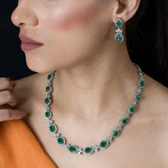 Emerald Doublet Necklace High End Jewelry adds Premium Quality greenstone and shiny cubic zirconia. Perfect for wedding jewelry or any special occasions. This green Paraiba tourmaline necklace surely add a touch of premium ness in your look. *𝐏𝐑𝐎𝐃𝐔𝐂𝐓 𝐃𝐄𝐓𝐀𝐈𝐋* * 𝐌𝐚𝐭𝐞𝐫𝐢𝐚𝐥: Brass * 𝐏𝐥𝐚𝐭𝐢𝐧𝐠: White Rhodium Plated * 𝐒𝐭𝐨𝐧𝐞: AAA-quality CZ Diamond & Emerald. *𝐃𝐈𝐌𝐄𝐍𝐒𝐈𝐎𝐍𝐒* *𝐍𝐞𝐜𝐤𝐥𝐚𝐜𝐞* * 𝐖𝐞𝐢𝐠𝐡𝐭: 39 gm  * 𝐋𝐞𝐧𝐠𝐭𝐡: 17.9 Inches * 𝐖𝐢𝐝𝐭𝐡: 0.5 Inch Exquisite Emerald Necklace For Formal Occasions, Formal Bridal Necklace With 17 Jewels And Emerald, Dazzling Emerald Necklace For Formal Occasions, Dazzling Jeweled Emerald Necklace For Formal Events, Exquisite Round Green Emerald Necklace, Formal Bridal Necklace With Emerald Gemstones, Exquisite Emerald Necklace For Formal Occasions - May Birthstone, Exquisite Emerald Necklace For Formal Occasions And May Birthstone, Formal Green Emerald Diamond Necklace