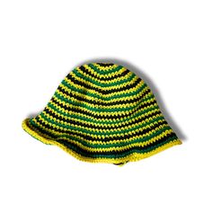 a green and yellow knitted hat on a white background