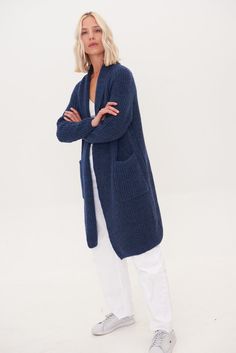 "Knitted with love, full sleeves length cardigan has no closure so it is super cosy to wrap yourself into skin friendly woolen coat. Minimalist scandi style skin soft womens cardigan made of 100% organic merino wool. Ideal choice for those people who has sensitive skin. Luxury merino wool is a lot smoother than normal wool, so it doesn't tickle the skin. Hand knitted sweater with two comfy pockets will keep you nice and cosy for many years. Sustainable organic wool garments are made by Scandinav Cozy Blue Sweater Coat For Layering, Blue Wool Cardigan For Layering, Navy Knit Winter Outerwear, Navy Knit Outerwear For Winter, Blue Shawl Collar Cardigan For Fall, Navy Long Sleeve Winter Cardigan, Cozy Blue Knitted Sweater Coat, Blue Open Front Cardigan For Winter, Cozy Navy Outerwear For Fall