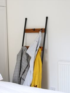 Floor-Drobe Saves Effort to Rummage Through Heaps of Worn Clothes Thrown on the Chair Clothes In Bedroom, Shelf Designs, Wooden Coat Hangers, The Chair, Shelf Design, Coat Hanger, The Clothes, Game Changer, Style Design