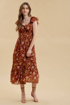 Burgundy floral midi dress with ruffle sleeve, sweetheart neckline, lace up back detail, and ruffled hem 100% polyester. Lined. Fall Floral Dress, Dress With Ruffle Sleeves, Bohemian Fall, Floral Print Fabric, Midi Dress With Sleeves, Romper Dress, Bohemian Clothes, Fall Floral, Floral Midi Dress