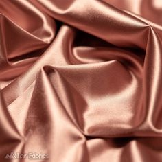 Description Add style and charm to your look with this Casino Shiny Rose Gold Spandex 4 Way Stretch Satin Fabric offering you the freedom to order exactly what you need for your next project. Rose Gold Casino Shiny Spandex 4 Way Stretch Satin Fabric Its 4-way stretch capability adds to its versatility. This means the fabric can stretch both horizontally and vertically, as well as diagonally, allowing for a comfortable and flexible fit in garments. Its stretch makes it suitable for clothing items Satin Material Fabrics, Ganpati Decor, Rose Gold Fabric, Rose Gold Satin, Stretch Satin Fabric, Satin Texture, Wholesale Roses, Fabric Roses, Gold Satin