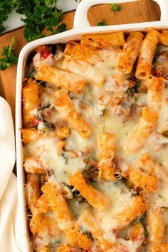 a casserole dish filled with pasta and cheese