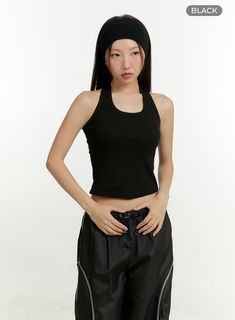 Product Detail Style : Street, Athleisure Detail : Cut out, Strap Print : Solid Material : Cotton Sleeve : Tank top Neck : Halter neck Length : Crop Cotton100 Color : Black, Light beige Model Size Model is wearing size S/M and the color Black. Height : 5'5" | 166cm / Top : S / Bottom : S (25 inch) .prddescription table, .prddescription td, .prddescription th { border : 1px solid black; border-collapse : collapse; padding: 10px; } Size(Inch) Size Shoulder Bust Armhole Hem Total Length S/M 6.3" 24 Basic Racerback Top For Streetwear, Casual Moisture-wicking Racerback Crop Top, Black Tank Crop Top For Sports, Black Tank Top Sportswear, Casual Sports Crop Top, Casual Moisture-wicking Crop Top For Sports, Trendy Racerback Tops For Sports, Black Tank Top For Gym, Black Tank Top Athleisure Style