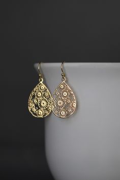 "Beautifully detailed 14k bright gold vermeil filigree teardrop flower charms simply dangle from 18k gold vermeil balled earwires. These lightweight go-with-everything earrings complete any outfit for daytime or evening. Gold flower charms: 19x29mm Total length of earrings: 1 1/2\" All gold is vermeil. A matching necklace is available... www.etsy.com/listing/942764148/gold-flower-pendant-necklace As the owner, maker, designer, and curator of this shop, I take great pride in providing you with je Earrings Gold Dangle, Turkish Gold Jewelry, Gold Teardrop Earrings, Statement Earrings Gold, Gold Flower Earrings, Flower Earrings Gold, Gold Filigree Earrings, Gold Earrings Models, Gold Jewellry