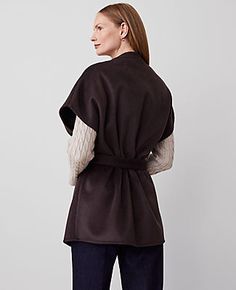 Wrap yourself in the elegance of autumn with the Ann Taylor Cap Sleeve Belted Poncho. This chic poncho is a must-have for your wardrobe, blending functionality with style.

- **Size:** XS/S
- **Color:** Chocolate
- **Material:** 67% Polyester, 25% Viscose, 8% Wool
- **Gender:** Female
- **Features:** Open front, cap sleeves, self-tie belt
- **Dimensions:** 28 1/2" x 33 1/2"
- **Care:** Machine washable

Designed for the modern woman, this poncho from Ann Taylor offers a sophisticated way to stay Chic Brown Cape For Fall, Fall Wrap-style Belted Outerwear, Fall Belted Wrap Outerwear, Belted Wrap Outerwear For Fall, Chic Fall Wrap Poncho, Poncho Outfit, Female Features, Female Design, Ladies Poncho