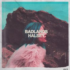 a woman with blue hair standing in front of a rock formation and the words badlands halsey over her face