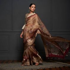 Indulge in the allure of our Pure Organza Saree, a limited edition creation with an enchanting print that captivates the senses. The saree is elevated by a gracefully crafted zari pallu and border, ensuring a blend of beauty and charm that is truly unmatched. Revel in the exquisite details of this exclusive piece. Slub Silk Saree With Sheer Dupatta, Festive Saree With Sheer Dupatta In Slub Silk, Transitional Slub Silk Saree With Sheer Dupatta, Festive Slub Silk Saree With Sheer Dupatta, Transitional Tussar Silk Blouse Piece With Sheer Dupatta, Transitional Tussar Silk Saree With Sheer Dupatta, Elegant Pre-draped Saree With Printed Border For Designer Wear, Elegant Transitional Slub Silk Pre-draped Saree, Traditional Drape Saree With Sheer Dupatta In Slub Silk