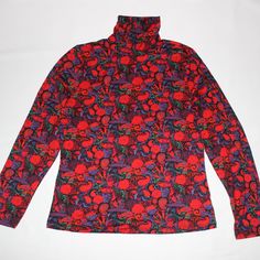 By Design Flame Turtle Neck Longsleeve Blouse Large Color: Red, Black Stretchy 95%Polyester, 5%Spandex Longsleeve Lightweight Machine Washable Wrinkle Free Msrp $29.99 Measurement: Shoulder 14.25"/Length 25"/Chest 18.5"/Sleeve 26" Red Elastane Tops For Spring, Winter Stretch Printed Top, Winter Stretch Floral Print Tops, Printed Stretch Elastane Tops, Red Printed Tops For Fall, Fall Red Elastane Tops, Red Floral Print Tops For Fall, Red Fitted Turtleneck Top, Fall Floral Print Red Top