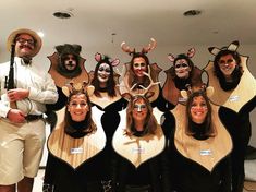 a group of people dressed up in animal costumes