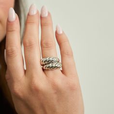 PRODUCT DETAILS Waterproof💧💧💧 Stainless Steel White Rhodium Hypoallergenic Nickel Free DESIGNER NOTE Discover the exquisite craftsmanship of our Braided Ring, a silver masterpiece that weaves together elegance and artistry. This ring's intricate braided design creates a striking visual texture that embodies both strength and grace, making it a symbol of timeless beauty and individuality. Style Tip: Elevate your Bohemian-inspired look by wearing the Braided Ring alongside layered bracelets and Silver Braided Ring, Braided Ring, Visual Texture, Flowy Maxi Dress, Layered Bracelets, Store Credit Cards, Timeless Beauty, Handcrafted Jewelry, Unique Style