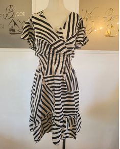 This Striped Flutter Sleeve dress goes from office to brunch and everywhere in between. It's the perfect summer dress. Light weight and breezy. Also see companion geometric design dress. One size fits most (0-12) 65% cotton 35% polyester Beer Sleeve, Christmas Catalogs, Flutter Sleeve Dress, Design Dress, Embroidery Dress, Perfect Summer, Flutter Sleeve, Geometric Design, Summer Dress