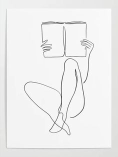 a black and white drawing of a person sitting on the ground with a book in their hands