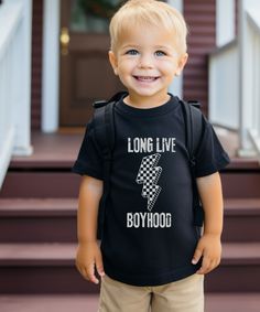 **Want it in a YOUTH size? Message us and we can create a youth listing for you LONG LIVE BOYHOOD!  We love the quality and softness of these Bella Canvas shirts, and we think you will, too!  We can say it till we are blue in the face but don't let them grow up too fast!  The PRINT Our printer uses direct-to-garment printing to make our products. The design ink is sprayed on, then allowed to soak into the fibers of the garment resulting in fine quality prints and a smooth finish on the garment. SIZING AND COLORS * See the pictures posted for this shirt to see the sizing chart and colors for this shirt style. * If you are unsure about sizing try this: Lay out a favorite shirt you currently have on a flat surface and measure the length of the     shirt and measure armpit to armpit. Next comp School Cotton Tops With Band Merch Style, Band Merch Cotton Tops For School, Cotton Band Merch Tops For School, School Tops In Cotton With Band Merch Style, School Band Merch Tops With Graphic Print, Band Merch Graphic Print Top For School, Long Live Boyhood, Growing Up Too Fast, Youth Shirt