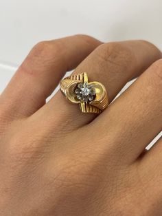 "Gold Spairel Tank Ring - 0.28CT Diamond, 18k Yellow Gold Ring, twister Ring, tourbillon Ring, Chunky Gold Ring, Estate Jewelry, Vintage ring \"Jewelry Material: Yellow Gold 18k (the gold has been tested by a professional) Total Carat Weight: 0.06ct (Approx.) Total Metal Weight: 4.23g Size: 7.25 US \\ 17.45 mm  Grading Results: Stone Type: Diamond Shape: Round Carat:0.06 ct (Approx.), Stones quantity: 1 Color: G Clarity: VS Modern Twist Rings With Single Cut Diamonds, Vintage Rings With Rotating Bezel For Anniversary, Yellow Gold Diamond Rings With Rotating Bezel, Vintage Anniversary Rings With Rotating Bezel, Gold Rings With Single Cut Diamonds Modern Twist, Modern Twist 14k Gold Rings With Single Cut Diamonds, Spiral Ring With A Modern Twist For Formal Occasions, 14k Gold Rings With Rotating Bezel For Anniversary, Spiral Yellow Gold Diamond Ring