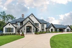 a large white house with lots of windows