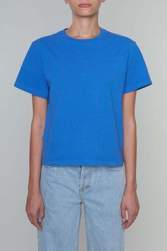 The shirt is the first release of our new colors line.    it’s a short sleeve garment dyed boxy t-shirt that pairs perfectly with jeans for everyday use.    it’s made of 100% cotton and features our signature colors blue tab.  the shirt is available in 8 classic colors in both single and multi-packs.    made in the usa Organic Cotton Cropped T-shirt With Short Sleeves, Boxy Short Sleeve Tops In Organic Cotton, Boxy Organic Cotton Short Sleeve Top, Boxy Organic Cotton Top With Short Sleeves, Boxy Organic Cotton T-shirt With Short Sleeves, Blue Relaxed Fit Cropped T-shirt For Summer, Blue Boxy Fit Cotton T-shirt, Blue Boxy Fit Top For Summer, Summer Blue Boxy Fit Tops