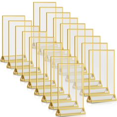 a set of six gold and clear acrylic boxes with dividers on each side