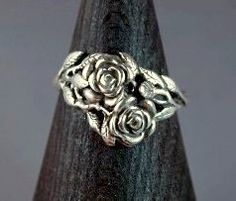 Silver Rose Ring Silver Flower Ring With Roses For Wedding, Silver Wedding Ring With Roses, Elegant Silver Rings With Rose Details, Elegant Sterling Silver Rings With Roses, Vintage Silver Jewelry With Roses, Silver Rose Ring Jewelry, Silver Rose Flower Ring For Anniversary, Silver Flower Ring With Roses For Anniversary, Sterling Silver Rose Design Flower Ring