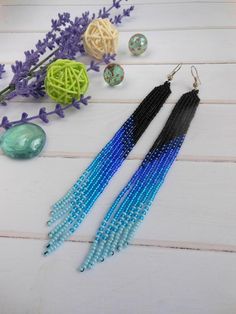 long blue earrings long beaded earrings handmade bohemian | Etsy Bohemian Blue Long Drop Beaded Earrings, Handmade Bohemian Blue Chandelier Earrings, Blue Dangle Chandelier Earrings For Summer, Unique Blue Earrings For Summer, Bohemian Long Drop Blue Jewelry, Bohemian Blue Long Drop Jewelry, Blue Beaded Long Drop Jewelry, Handmade Blue Long Drop Jewelry, Handmade Blue Chandelier Earrings For Festival