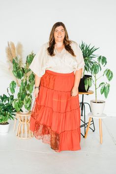 This maxi skirt is perfect for any occasion! It features a tiered design with lace fabric and a clay red color. High waisted for ultimate comfort and style. Look and feel your best in this elegant skirt! Fit: Relaxed Jo is 5’3” and wears size 14W/Misses 16 and is wearing XL Ashley (Platinum Blonde) is 5'4" and wears a size 2/25 wearing Small Hannah (Dark Brown Hair) is 6' and wears a size 22W and is wearing 3XL Material: 100% RayonBrand: White Birch Flowy Tiered Lace Maxi Skirt, Flowy Tiered Lace Skirt, Bohemian Tiered Skirt With Lace Trim, Overall Skirt Denim, Lace Maxi Skirt, Skirt Crop, Maxi Lace Skirt, Summer Denim, White Birch