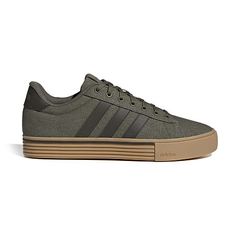 Stride with style in the daily 4. 0 shoes from adidas, a unisex choice for casual or street wear. These low-profile, sport-inspired shoes boast a durable rubber outsole and comfortable textile-synthetic upper for everyday comfort. With regular fit and lace closure, this footwear offers a classic spin to the modern skateboarding aesthetic.Closure Type: Lace-UpFootwear Technology: Adidas-CloudfoamUpper/Outer Base Material: 50% Textile, 50% SyntheticShoe Lining Material: TextileSole Material Conte… Skateboarding Aesthetic, Sneakers Green, Lace Closure, Skateboarding, The Modern, Skateboard, Athletic Shoes, Shoes Sneakers, Street Wear