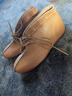 Genuine handmade, leather turn shoes. No heel. Leather Round Toe Moccasins, Leather Lace-up Boots With Soft Sole, Leather Moccasins With Round Toe And Leather Footbed, Leather Round Toe Moccasins With Leather Footbed, Leather Boots With Soft Sole, Leather Boots With Soft Sole And Closed Toe, Soft Sole Leather Boots With Closed Toe, Brown Leather Boots With Soft Sole, Leather Moccasins For Galas