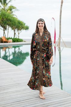 The perfect gift for anyone who loves the finer moments in life, this soft and sexy kimono robe is crafted by hand with strong attention to detail. With a gorgeous print and exclusive stitches, it's perfect for an extended variety of use. Elevate your kimono experience with the luxurious touch of our blended silk viscose fabric. This exquisite material harmoniously combines the elegance of silk with the comfort of viscose, resulting in a fabric that drapes effortlessly and exudes a subtle sheen. Multicolor Wrap Robe For Loungewear, Printed Sleepwear With Kimono Sleeves For Loungewear, Floral Print Long Sleeve Sleep Kimono, Long Printed Robe For Loungewear, Long Floral Print Robe For Loungewear, Beachwear Kimono With Kimono Sleeves For Daywear, Daywear Kimono With Kimono Sleeves For Beach, Long Printed Kimono For Loungewear, Beachwear Kimono For Daywear