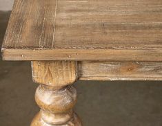 an old wooden table that has been stained brown