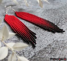 "These red beaded earrings pair amazingly with any outfit, dressy or casual. They will emphasize your individuality and compliment your personality on various occasions. Perfect for looking pulled together and on trend. They are made of high-quality Czech colored beads with sterling silver hooks and silicone plugs. Colors: red, dark red, black. Length: 4.5 inches (11.5 cm) Width: 0.78 inches (2 cm) Materials:     Czech \"Preciosa\" beads     Durable synthetic thread     Sterling silver ear hooks     Silicone plugs If you are on the hunt for a gift that will show your significant other some love, these picks are a great solution to surprise and delight. I hope you can find everything here that you were looking for. If you have any questions related to earrings design, please feel free to co Cheap Red Beaded Dangling Earrings, Cheap Red Statement Beaded Earrings, Cheap Red Beaded Earrings For Holiday, Cheap Red Crafted Beaded Earrings, Cheap Red Beaded Earrings, Cheap Red Bohemian Beaded Earrings, Cheap Red Fringe Jewelry, Affordable Red Faceted Bead Earrings, Cheap Red Beaded Earrings For Party