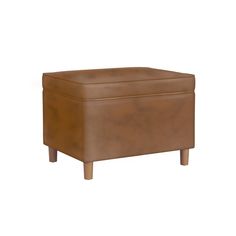 Our classic Dinah storage ottoman is designed with function and fashion in mind. Enjoy this simple shape in a smaller space or pair two together for a seating statement at the end of a bed or around a living room. Made with a durable Dark Brown faux leather and wood legs in a Honey Oak finish, along with soft-close safety hinges, this ottoman is easy to assemble and easily spot-cleaned. Overall Height: 18 inches Overall Depth: 18 inches Overall Width: 24 inches Square Storage Ottoman, Leather Storage Ottoman, Round Storage Ottoman, Leather And Wood, Honey Oak, Cube Ottoman, Round Storage, Mdf Frame, Round Ottoman